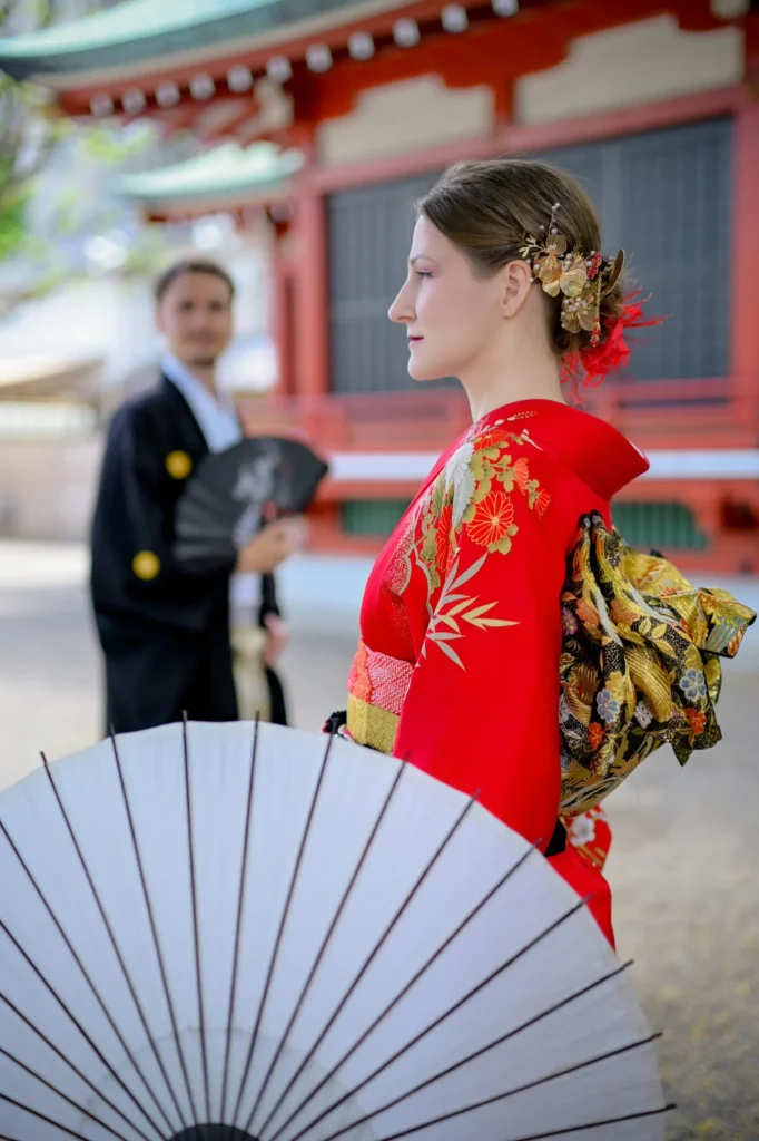Couple wearing furisode kimono walking near Sensoji Temple Asakusa Tokyo