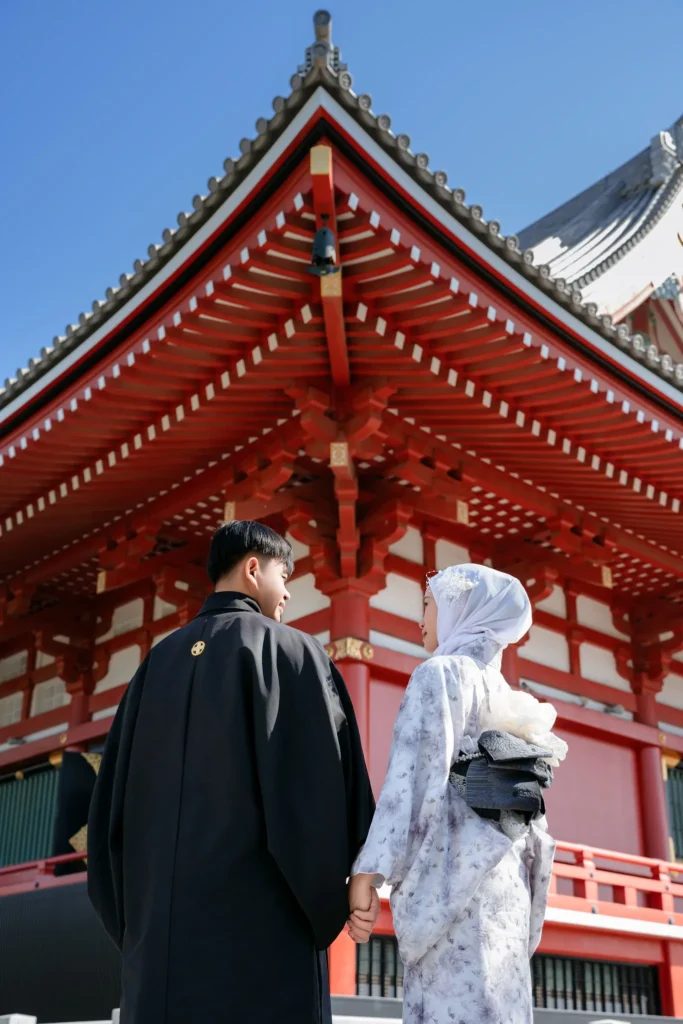 Couple wearing lace kimono walking near Sensoji Temple Asakusa Tokyo