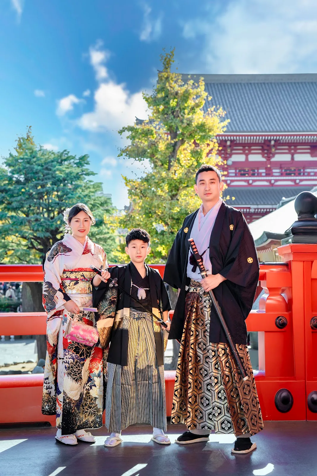 Boy in hakama with his parents in kimono at Sensoji Temple, Asakusa