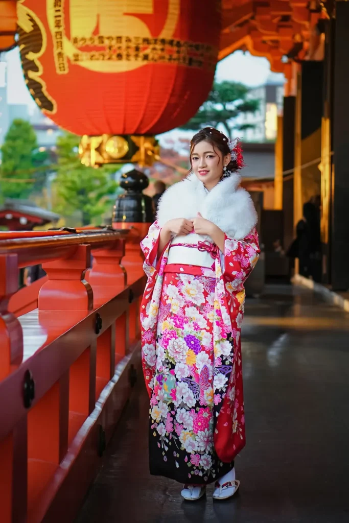 Pink floral furisode and white fur shawl under the giant red lantern at Sensoji Temple, Asakusa